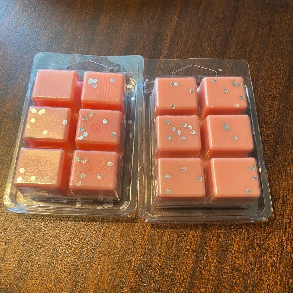 Two packages of candle wax melts, scent is fruity candy. New, Price is firm